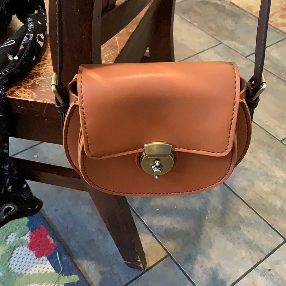 Hand crafted leather cross body purse